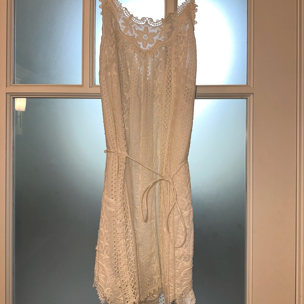 Zimmerman white eyelet romper with charms. Size 0. Fully lined.